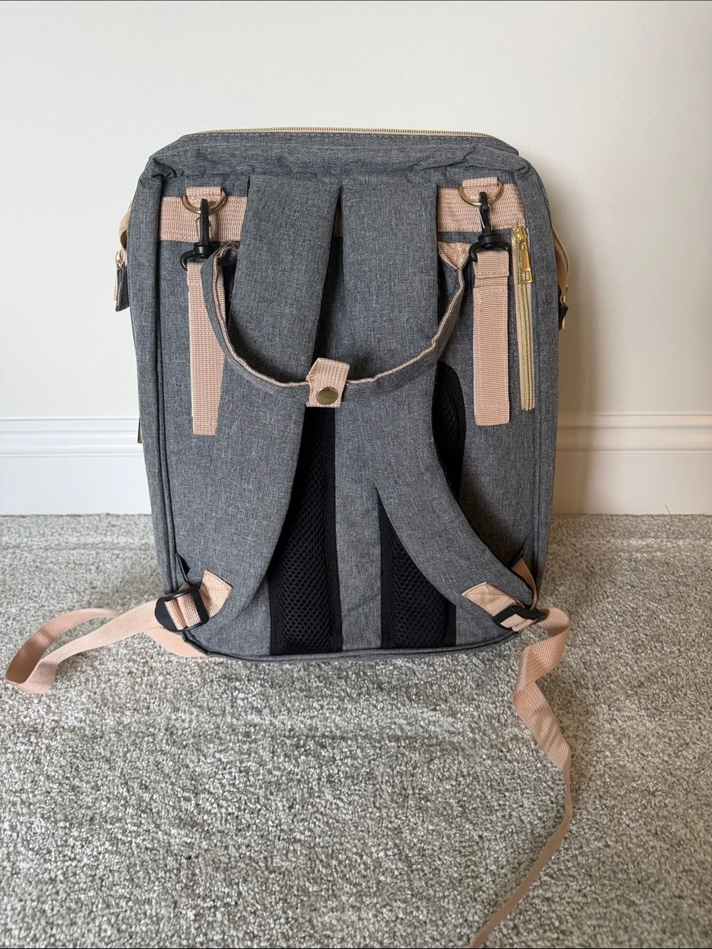 Diaper backpack with changing station